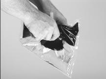 Pull outward on the sides of the bag, allowing the resin to mix with the hardener.