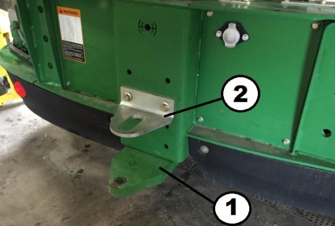 Installation Instructions for 8000-Series SPFH 1.0 Preparing the Machine 1.1 Park Machine Park machine on a flat, hard surface. Set Park Brake. Lower header to the ground. Remove key from ignition. 1.2 Remove Hitch and Strap.