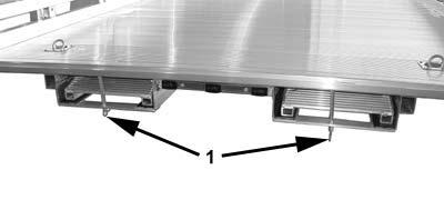 travel. Ramps in Storage Figure 5-5 ^ CAUTION Use a safe lifting procedure to prevent injury when handing ramps.