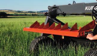 The Spreading Plate The spreading vanes are placed further back on the mowing unit than