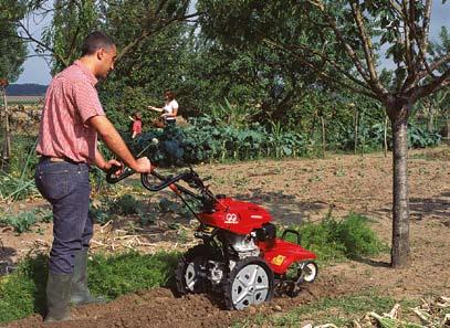 Front mounted counter-rotating tines allow deep tilling. Adjustable transport wheel.