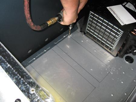 Use air saw/jigsaw to cut through truck floor.