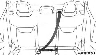 3. Sit back in seat. Slide the regular latch plate up the webbing as far as necessary to allow the seat belt to go around your lap. 4.