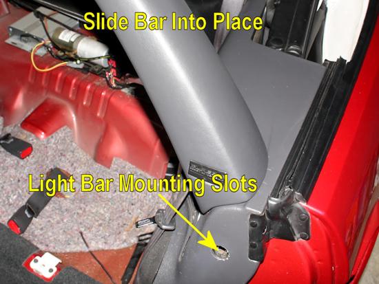 Go ahead and replace the panel pins, seat belt, and plastic trim at the bottom of the door. 39.