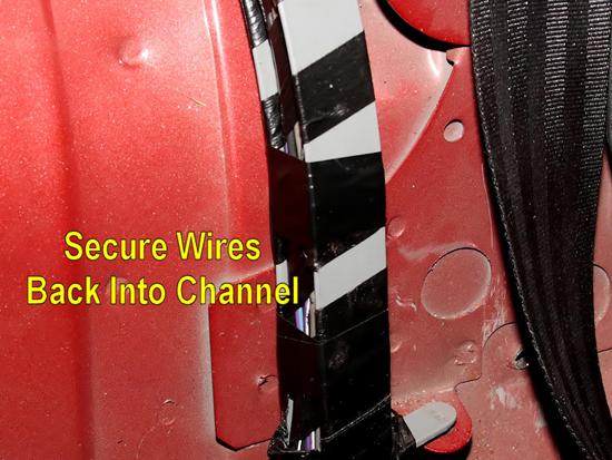 44. Secure the wires back into the channel, and rewrap the channel with electrical tape to hold them into place.
