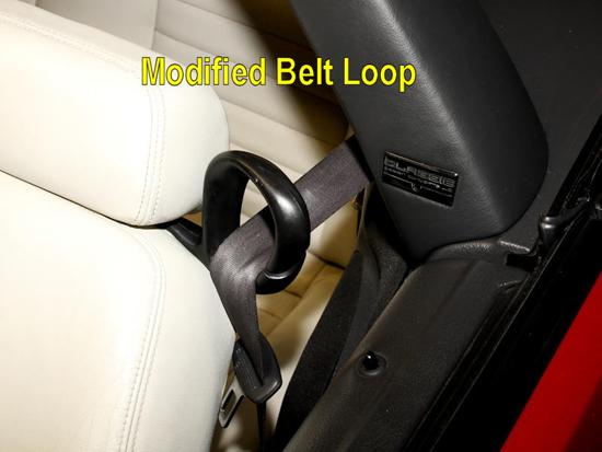 The seat belt loop should now clear the light bar when