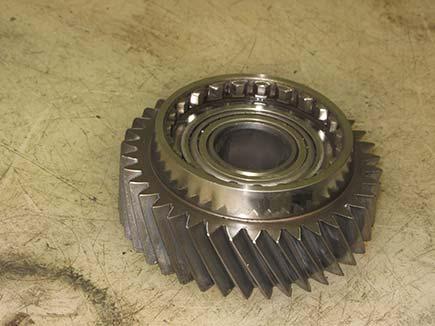 Drive the bearing into place using the bearing driver,