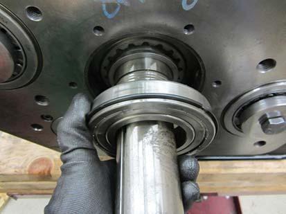 Install the snap ring that retains the Input Shaft to the Main Drive Gear 7.