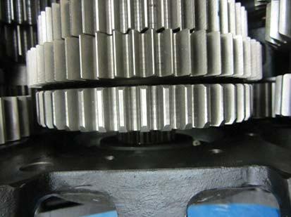 Move the Reverse Gear forward against 1st Gear, engaging the splines of the Main Shaft Sliding Clutch.