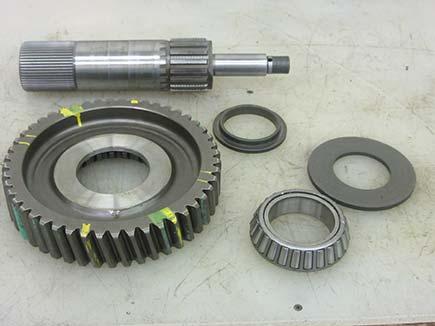 Using the Deep Reduction Gear front as a base, press the Output Shaft through the