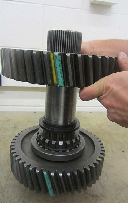 Install the Deep Reduction Gear over the Auxiliary Mainshaft with the clutching splines facing towards the front of the shaft.