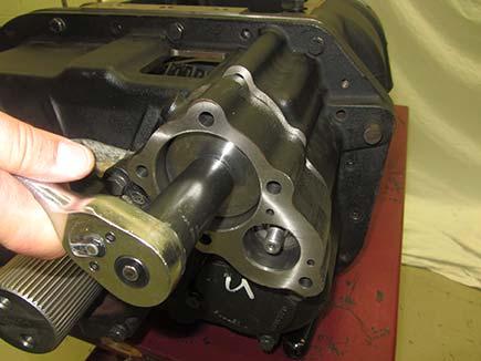 housing into the Auxiliary Case Housing. 6. Insert the Reduction piston with flat side to rear.