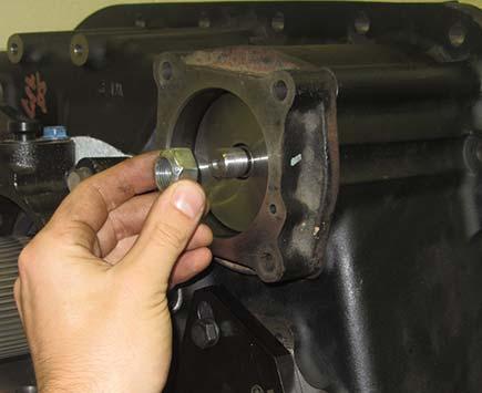9. Install a new gasket on the Cylinder Housing Cover mounting surface.