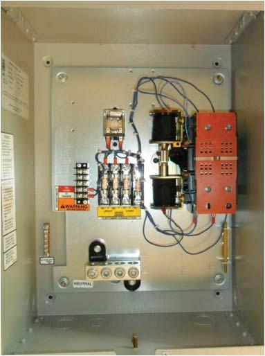 After mounting the switch, remove the cover to make the electrical connections (see Figure 7).