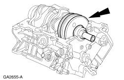 NOTE: Using a suitable lever of similar tool position the crankshaft rearward before installation of upper thrust bearings.