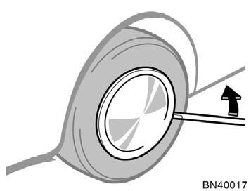 Removing wheel ornament (steel wheels) Loosening wheel nuts CAUTION Never use oil or grease on the bolts or nuts. The nuts may loose and the wheels may fall off, which could cause a serious accident.