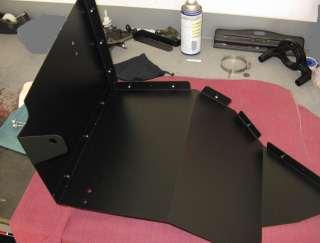Attach the rear heat shield panel C to the bottom heat