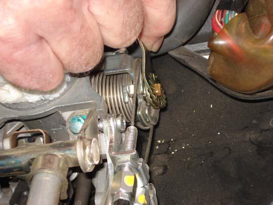 The throttle drum is somewhat masked by the crankcase breather hose in the