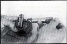 -Measure the diameter of the piston pin hole.