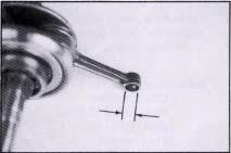 -Measure the piston pin outside diameter.