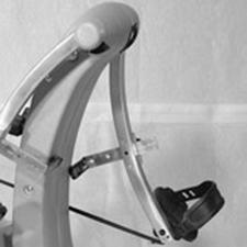 Setting Pedal Stops Pull the pole free of P44, grasp the front handle and gently roll the device underneath chair seat far enough that the pole can be slid behind the front legs.