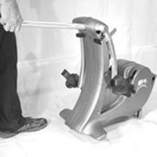 Releasing the pedal arm while adjusting the pedal stop could result in arm springing back. Ensure P44 is securely attached via chair pole to front legs before use.