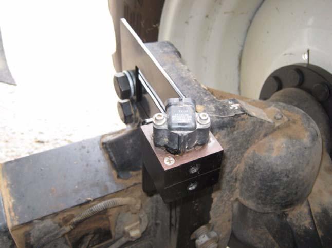 Mounting Wheel Angle Sensor Hardware 6. Mount the Wheel Angle Sensor to the bracket with the two kit provided bolts.