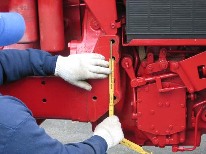 Measure Determine where the lift upright may be attached to tractor. This will vary depending on the model and/or presence of a loader attachment.