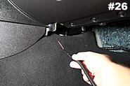Then take the passenger side black wire from the wiring harness and insert it into the other hole.