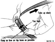 If the seat belt cannot be pulled out of the retractor, firmly pull the belt and release it. You will then be able to smoothly pull the belt out of the retractor.
