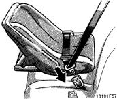 1. Run the lap and shoulder belt through or around the infant seat following the instructions provided by its manufacturer and insert the tab into the buckle taking care not to twist the belt.