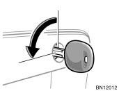 After closing the trunk lid, insert the master key and turn it counterclockwise to deactivate the lock release