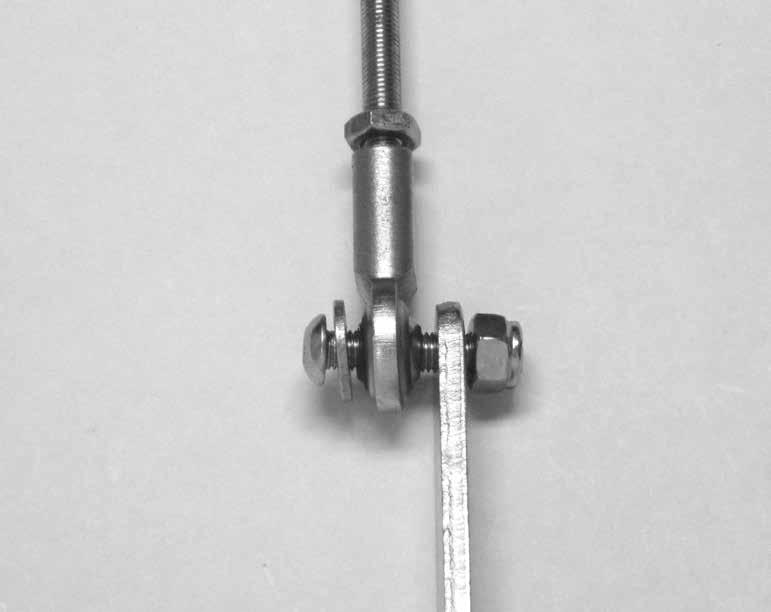 Threaded Rod The bolt can be installed in either direction, but make sure the Rod End is sandwiched between the Flat Washer and the Quad Arm.