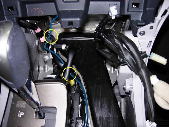 Continue routing the switch cable to the right of the shifter assembly (Fig. 1-26). 4.