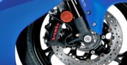 This endurance-race-proven design, along with a lightweight fully adjustable Showa rear shock, delivers more effective, linear damping performance,