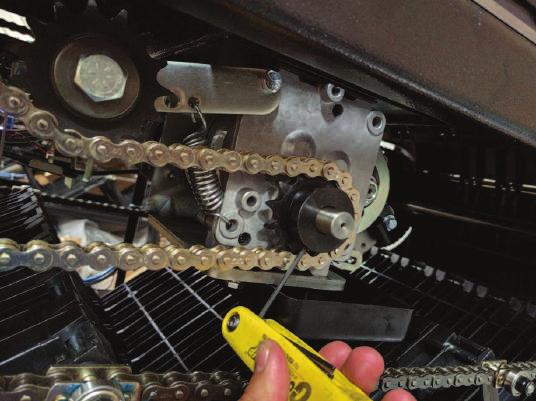 2. Use a 1/8 hex key to loosen the transmission sprocket