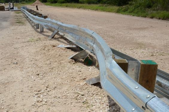 MASH compliant W-beam median barrier system was developed and tested successfully per MASH TL-3 tests conditions.