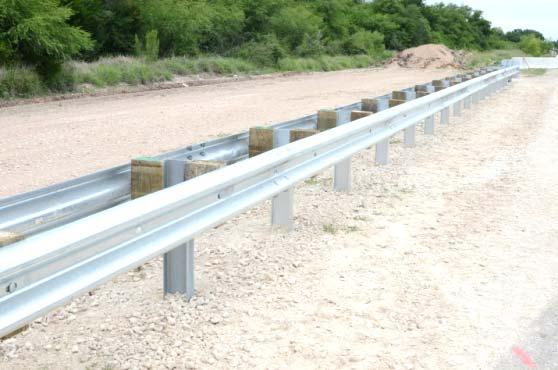 Figure 16 TxDOT 31-inch W-beam median barrier installation MASH test 3-11 involves a 2270P vehicle weighing 5000 lb ±110 lb and impacting the TxDOT 31-inch W-Beam Median Barrier at an impact speed of