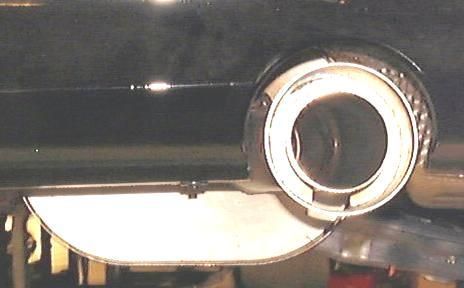 10. Visually inspect the muffler. Check for at least ½ clearance in all areas. Make sure the polished tips are centered in the bumper cutouts. See figure 11. Fig: 11 11.