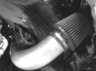 f. Install the air filter on the long end of the 4 diameter elbow. From underneath the vehicle, position the assembly so that the intake pipe and air filter do not make contact with the vehicle.