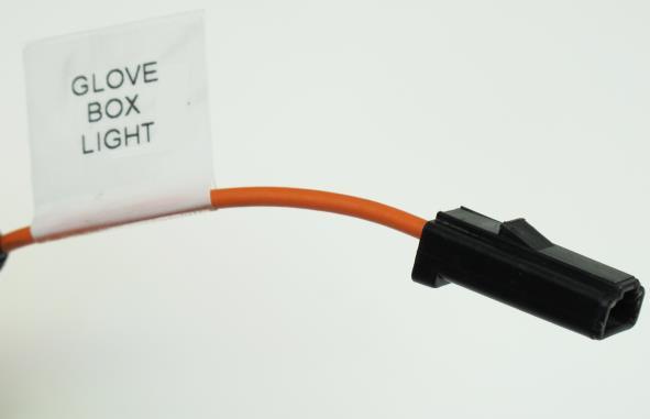 The wire found on the Painless harness will have a single pin black connector preinstalled, with a section label reading GLOVE BOX LIGHT, this wire is: Orange: 18 gauge, printed #971 GLOVE BOX LIGHT