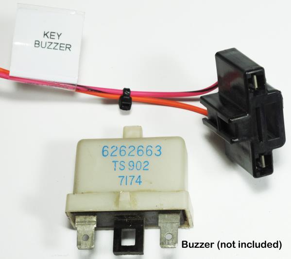 Key Buzzer Locate the 2 pin black connector labeled KEY BUZZER. This connector will plug into an installer supplied key buzzer removed from the factory harness of 1972+ vehicles.