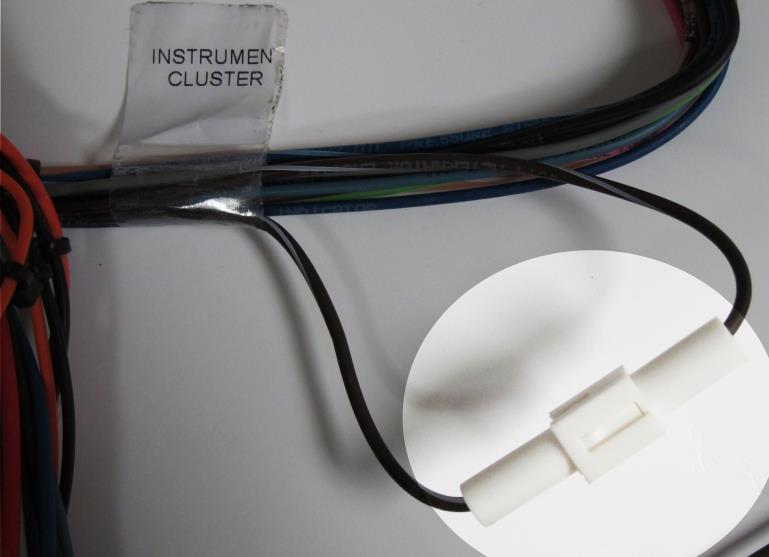 These lights are typically a two wire install. Cut the white connectors from the Painless harness.