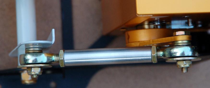 The image (below) shows the hardware components and placement. NOTE TWO standard thickness washers on the inside of each rod end bearing.