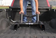 Then pull the handle outwards and then towards the truck bed again. 2.