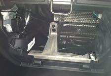 Remove the glove box to gain access to the back side by pressing the side of the inter glove box towards