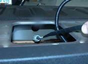 12. Route the supplied Camera Harness through the pass-through hole in the inner brace of the tailgate. 17.