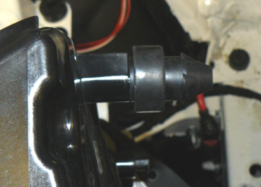 Loosen the worm clamp as shown by Arrow A in