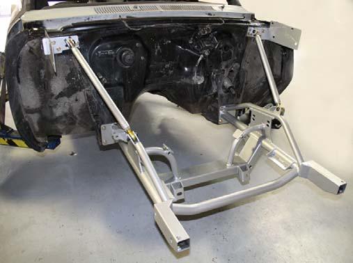 Shown is the passenger side on a 66-67 Nova. The 62-65 Nova brackets are shaped different but install in the same manner. 9. Pro-Touring Suspension Clip Installed.