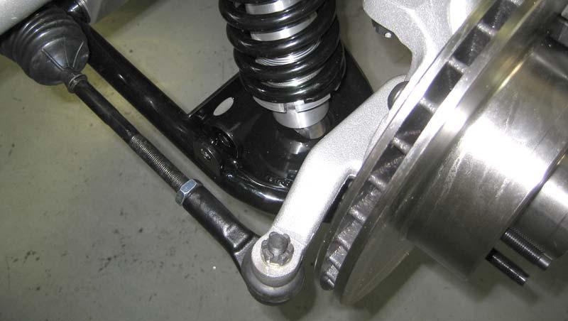 (This rack was 17 ¾). Turn the pinion in the opposite lock position and measure from the same point to the end of the same tie rod (11 ¾). 17 ¾ minus 11 ¾ = 6.